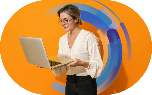 woman holding laptop happily using avyre solutions